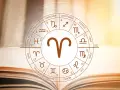 Koło zodiaku z symbolem Barana w centrum. 21.03 to początek tego znaku zodiaku.