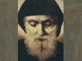 Święty Szarbel, którego cuda są znane na całym świecie, na portrecie z brodą i w habicie.