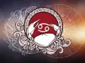 Symbol Raka, 22.07 znak zodiaku, otoczony kryształami i kołem zodiaku.