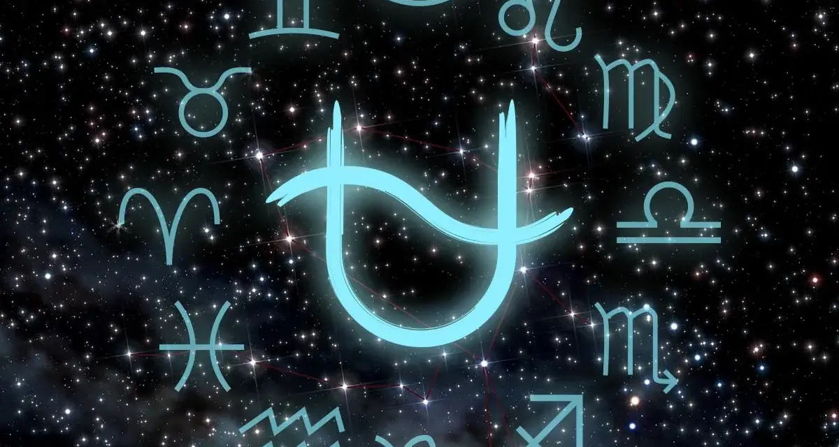 Jasny symbol Panny w zodiaku otoczony innymi znakami, na tle rozgwieżdżonego nieba.