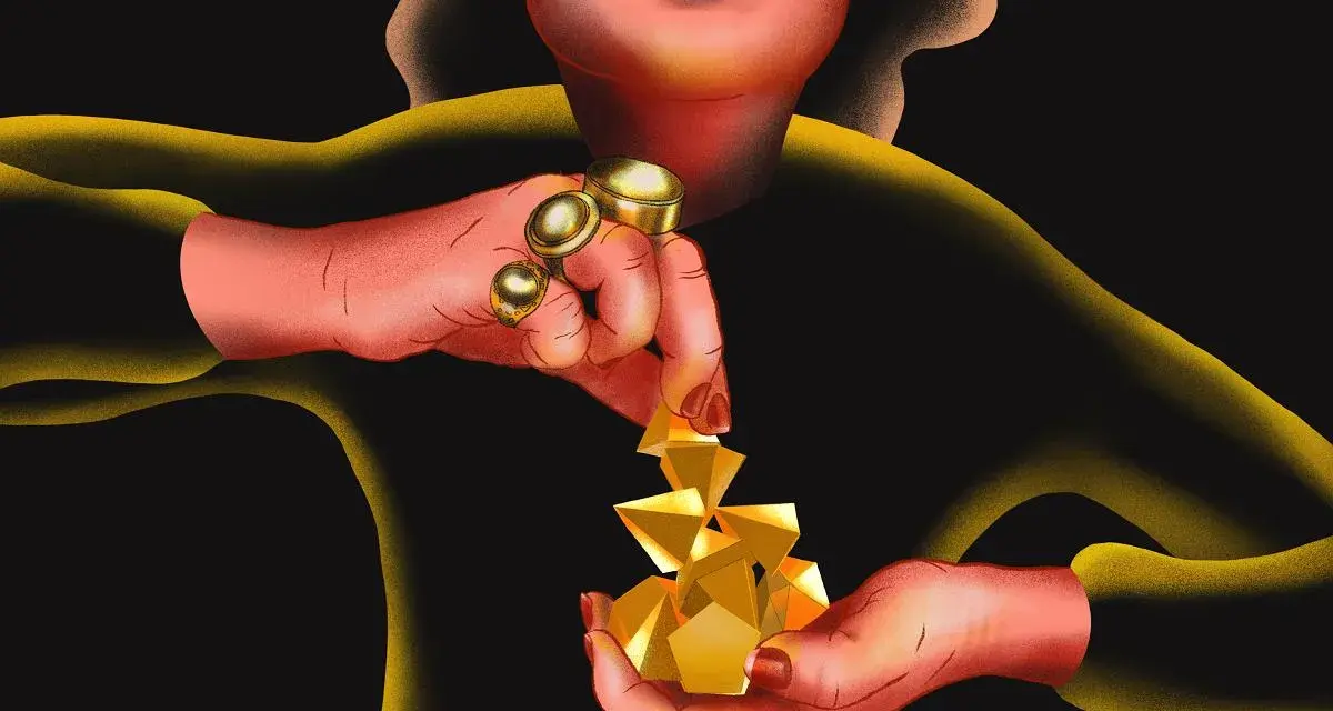 Dłonie z pierścieniami układają złote bryły, przypominające 3 denary tarot.