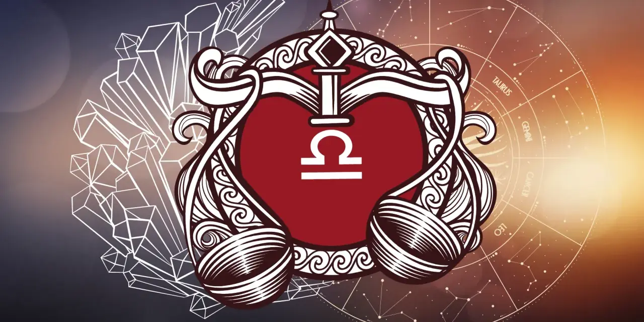 Symbol wagi znak zodiaku w ozdobnej ramie, otoczony kryształami i kołem zodiaku.