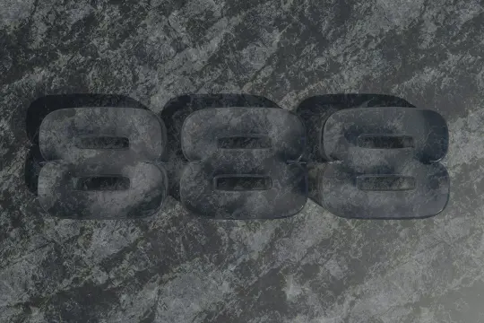 Trzy przezroczyste ósemki na kamiennym tle. 888 znaczenie symbolizuje obfitość i duchowe przebudzenie.