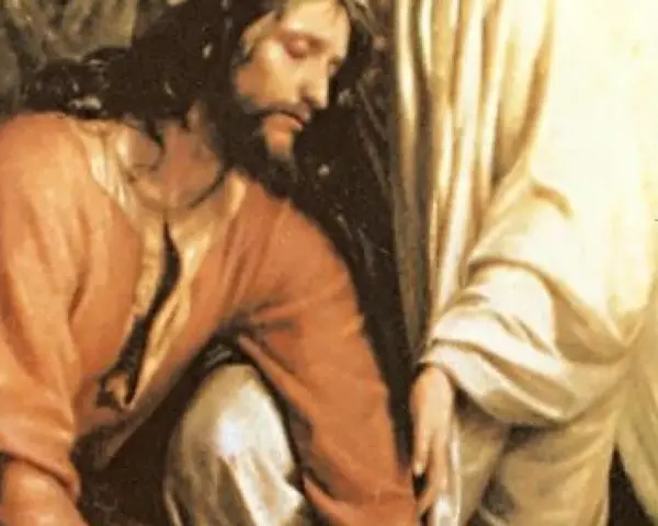 Jezus klęczy w Ogrodzie Oliwnym, pogrążony w modlitwie. Obok niego anioł podtrzymuje go.