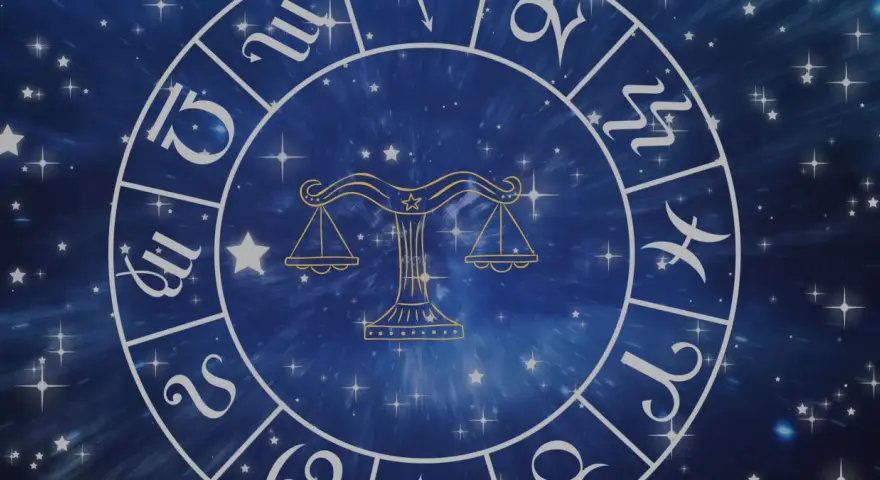 Zodiakalny krąg z symbolem Wagi w centrum. Wokół widoczne inne znaki powietrzne i gwiezdne tło.