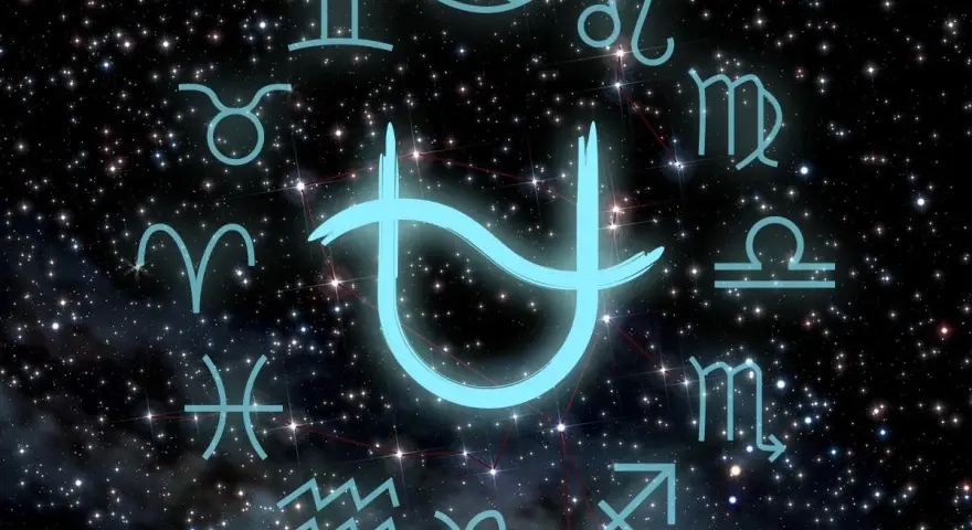 Jasny symbol Panny w zodiaku otoczony innymi znakami, na tle rozgwieżdżonego nieba.