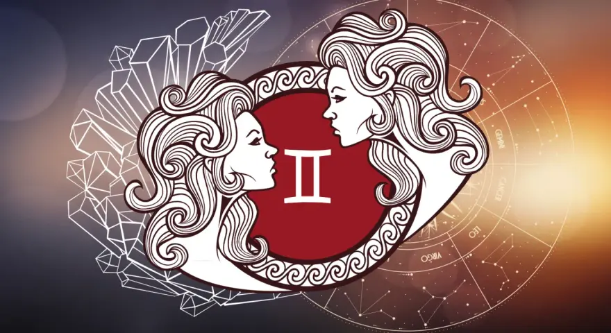 Dwie twarze Bliźniąt patrzą na siebie, symbolizując ich związek. W tle koło zodiaku i kryształy.