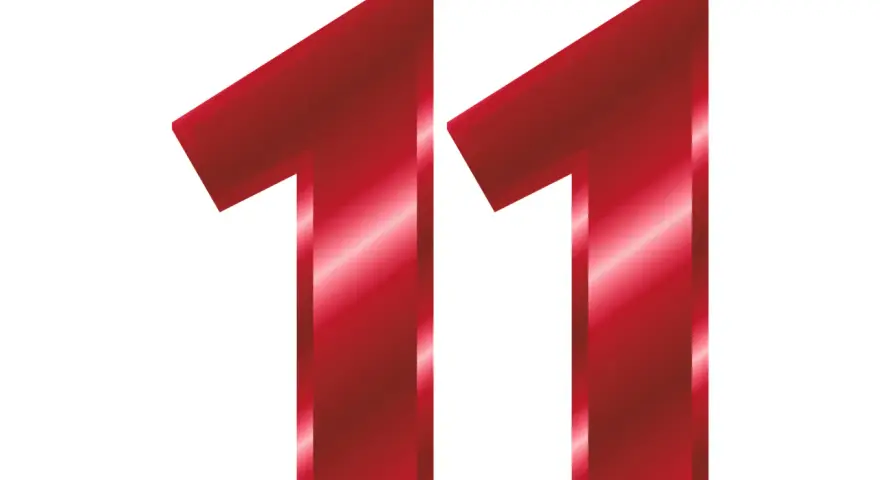 Czerwone, błyszczące cyfry 1 i 1 tworzą liczbę 11. W numerologii 11 jest liczbą mistrzowską, ale redukuje się do 2 (1+1). Może też symbolizować połączenie energii numerologicznej 3 i 11.
